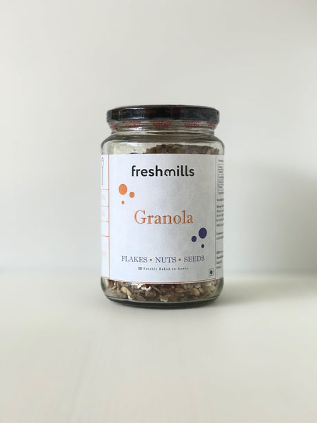 Granola With Puffed Jowar, Red Rice flakes, Walnuts, Dates and Melon Seeds - Freshmills - Freshmills